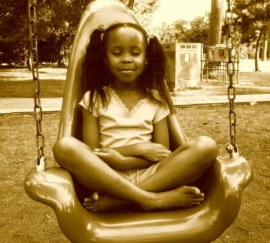 af-am-girl-meditating-in-swing-for-site