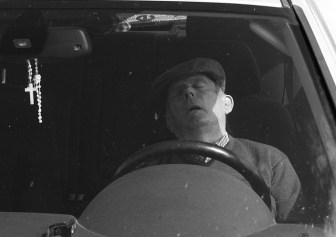older-spanish-man-zonked-in-car-crop-2